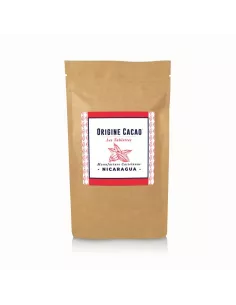 Sachet en kraft with label “Origine Cacao Nicaragua” sur espace blanc, packaging artisanal.